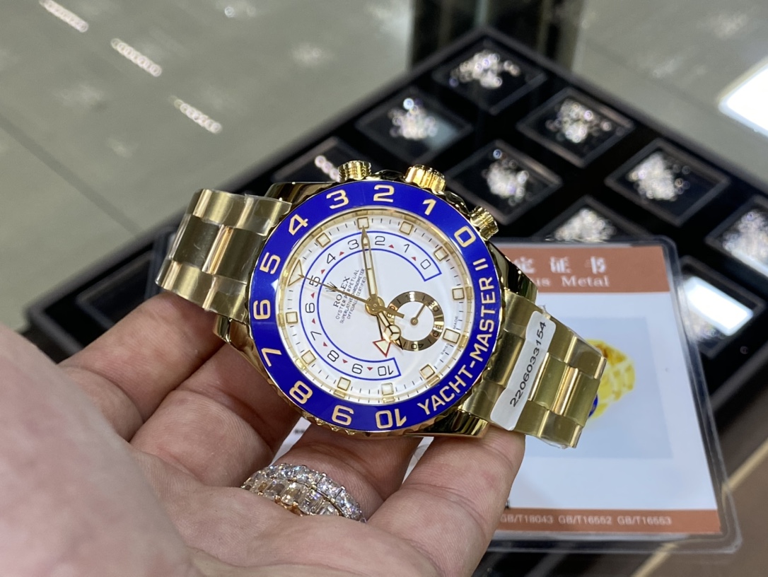 Rolex Yacht-Master II m116688-0002 Gold Watch Replica in hand front view