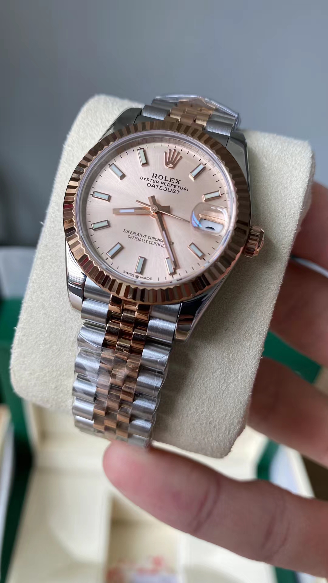 Rolex Datejust 41 mm Pink Dial m126331-0010 Men's Watch Replica in hand front view