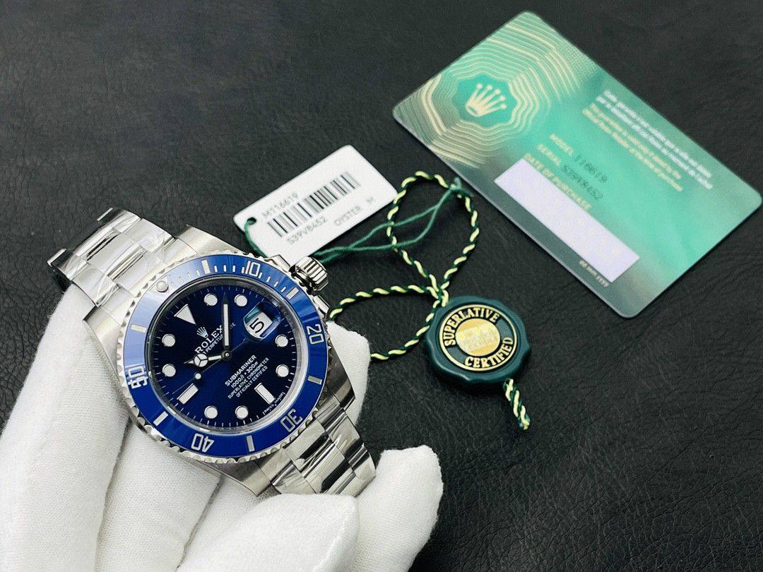 Rolex Submariner For Sale - Blue Bezel 41 MM m126619lb-0003 Men's Watch Replica in hand and rolex card and gift in background