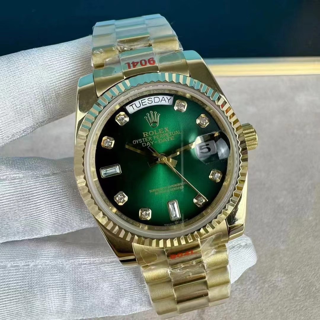 Rolex Day-Date green dial gold strap 118238 on white gloves front view