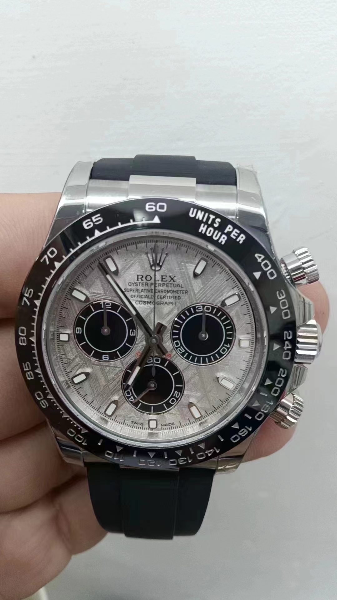 Rolex Daytona White Gold Replica shown on hand